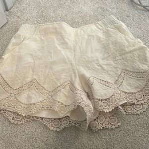 Cream scalloped shorts